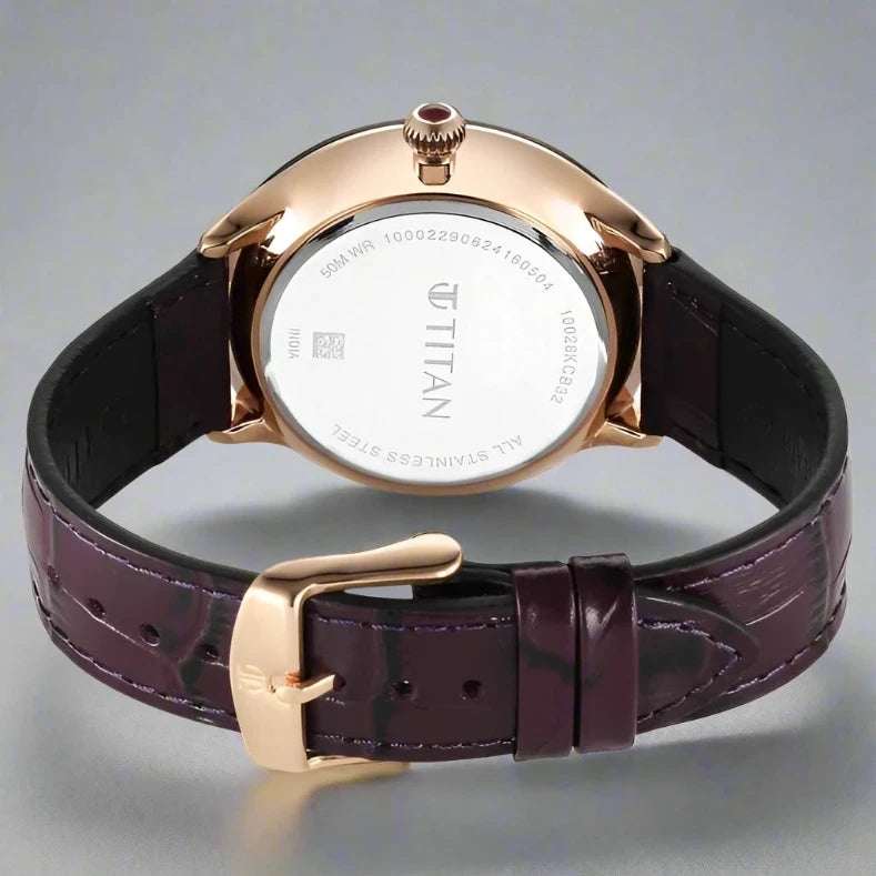 A bold and stylish Titan men's watch featuring a black dial, a durable leather strap, and a sophisticated analog design, perfect for modern elegance and everyday wear