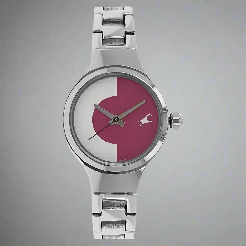 Fastrack 6134SM02 women's analog watch featuring a stylish silver dial, stainless steel case, and a sleek silver metal strap. A modern and elegant timepiece for any occasion.