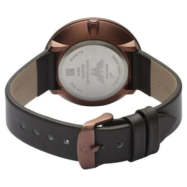 Fastrack 6242QL01 women's analog watch featuring a stylish black dial, rose gold-tone stainless steel case, and a premium brown leather strap. A chic and elegant timepiece for any occasion.