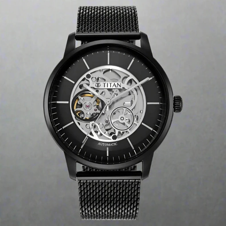 A bold and elegant Titan men's watch featuring a sleek black dial, matching black stainless steel strap, and a sophisticated analog design, perfect for modern style and versatility.