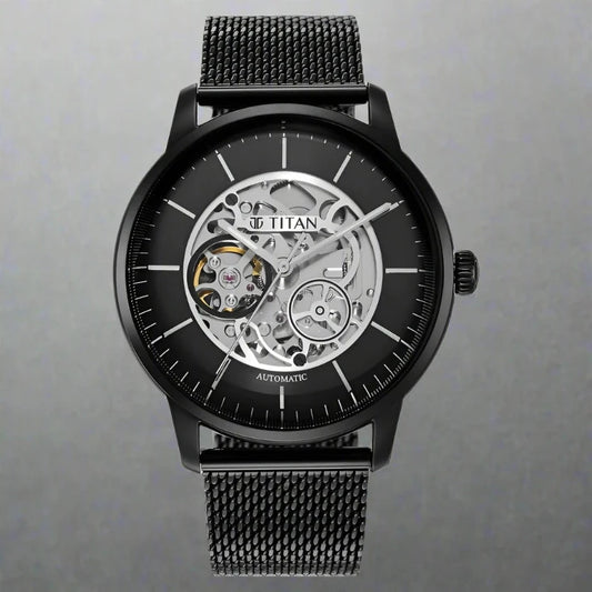 A bold and elegant Titan men's watch featuring a sleek black dial, matching black stainless steel strap, and a sophisticated analog design, perfect for modern style and versatility.