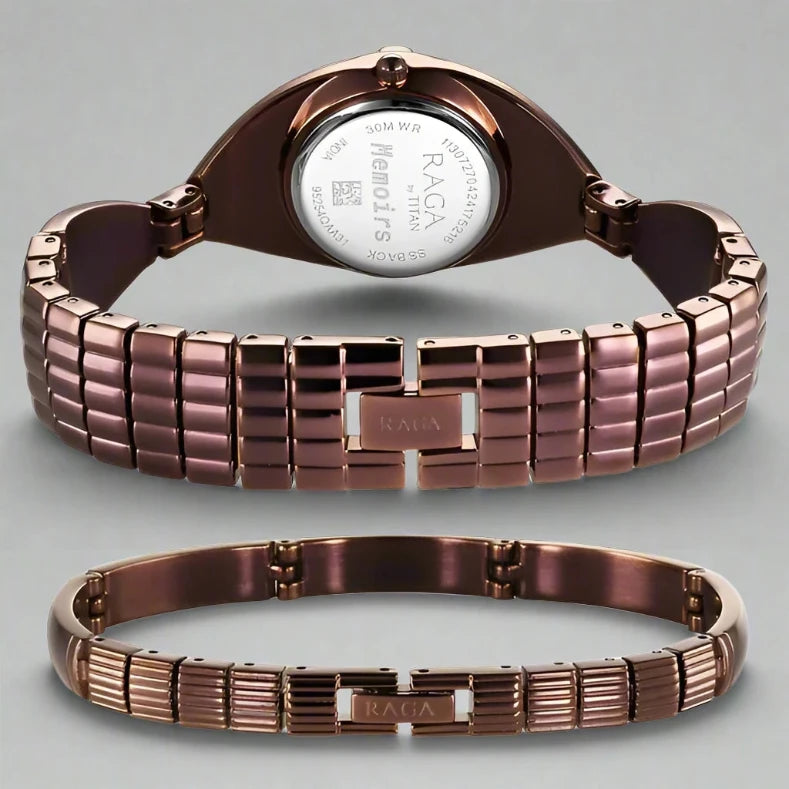 A luxurious Titan women's watch featuring a rose gold-tone stainless steel strap, an elegant dial with intricate detailing, and a sophisticated analog design, perfect for special occasions and everyday elegance.