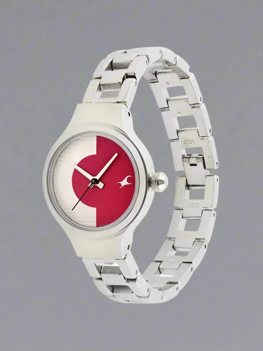 Fastrack 6134SM02 women's analog watch featuring a stylish silver dial, stainless steel case, and a sleek silver metal strap. A modern and elegant timepiece for any occasion.