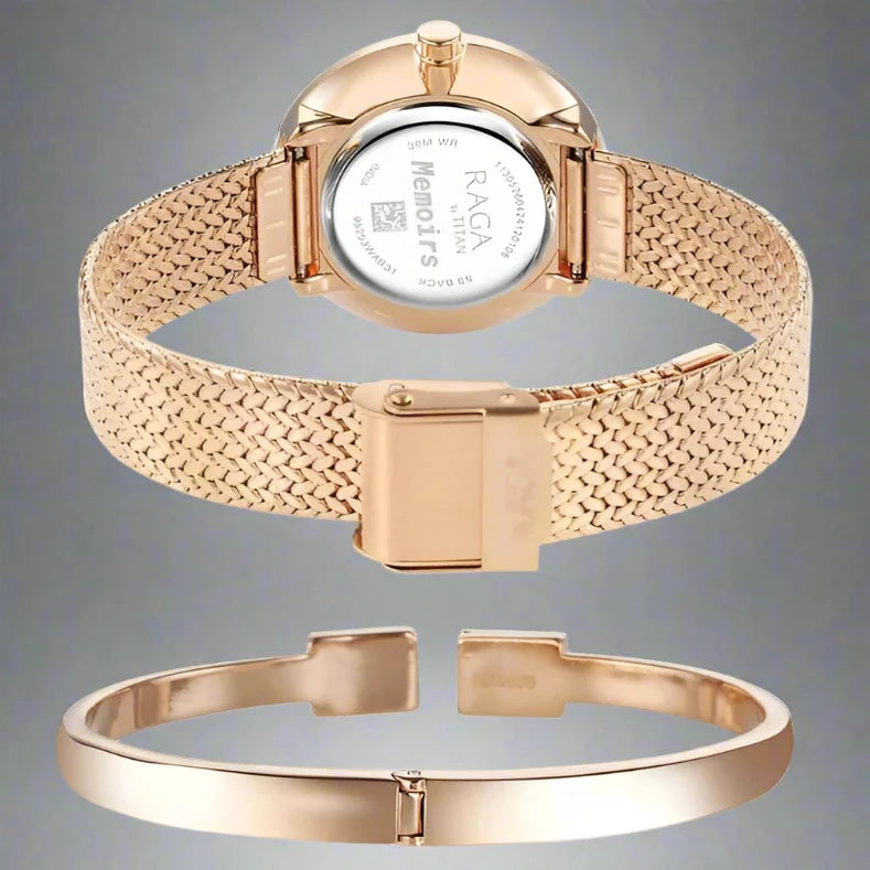 An exquisite Titan women's watch with a gold-tone stainless steel strap, a beautifully detailed dial, and a sophisticated analog design, perfect for adding elegance to any outfit.