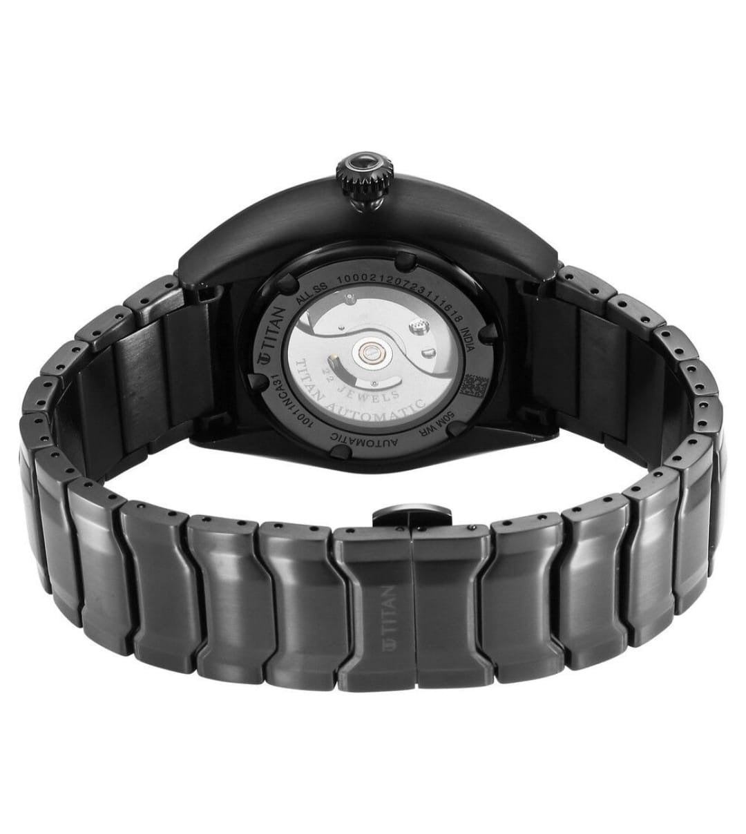 Back View Of Titan NS10011NM01 Stellar Automatic Black Dial Stainless Steel Strap Watch for Men, featuring a 3D involute dial, shuttle-inspired indices, and an open-heart automatic movement.