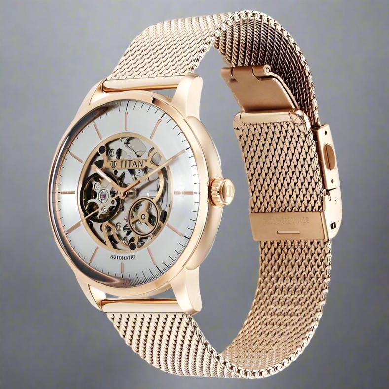 Close View Of Titan NS90110WM01 Mechanical Silver Dial Analog Stainless Steel Strap Watch for Men, featuring a sleek silver dial, stainless steel case, and push-button clasp.