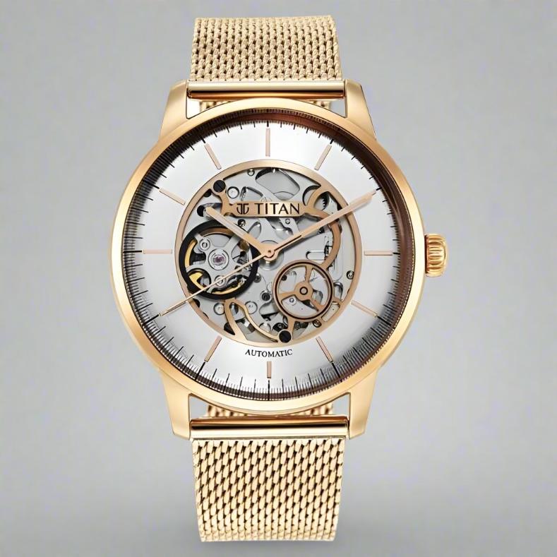 Titan NS90110WM01 Mechanical Silver Dial Analog Stainless Steel Strap Watch for Men, featuring a sleek silver dial, stainless steel case, and push-button clasp.