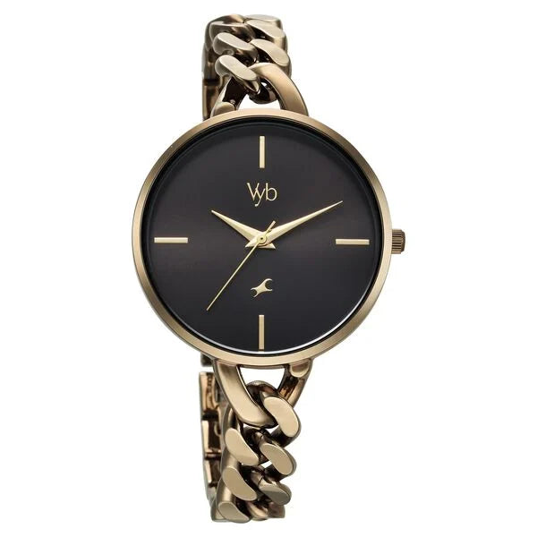 A black dial watch with a gold metal strap, featuring the Vyb by Fastrack brand logo at the center.