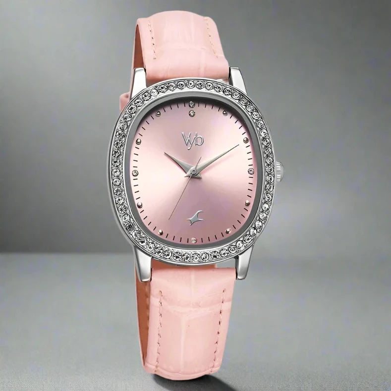 Front Look Of Fastrack FV60049SL01W Vyb Mirage Quartz Analog Watch with a pink dial and matching pink leather strap, designed for girls.