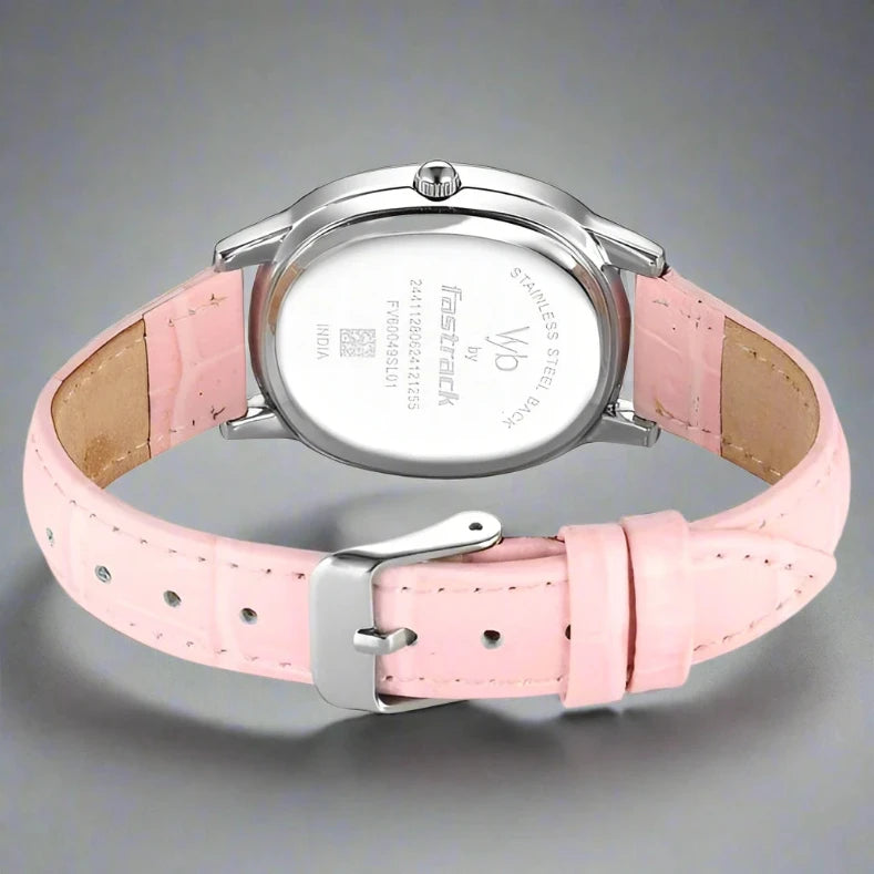 Back Look Of Fastrack FV60049SL01W Vyb Mirage Quartz Analog Watch with a pink dial and matching pink leather strap, designed for girls.