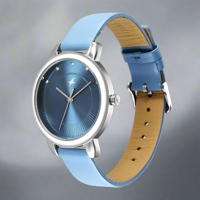 Side Look Of Fastrack NS6282SL01 Stunners Quartz Analog Watch with a blue dial and matching blue leather strap, designed for girls.