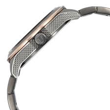 A sophisticated Titan men's watch with a striking blue dial, a durable stainless steel strap, and a classic analog design, perfect for modern elegance and everyday wear.