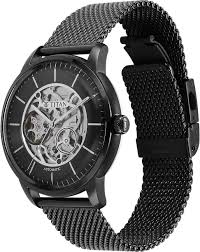 A bold and elegant Titan men's watch featuring a sleek black dial, matching black stainless steel strap, and a sophisticated analog design, perfect for modern style and versatility.