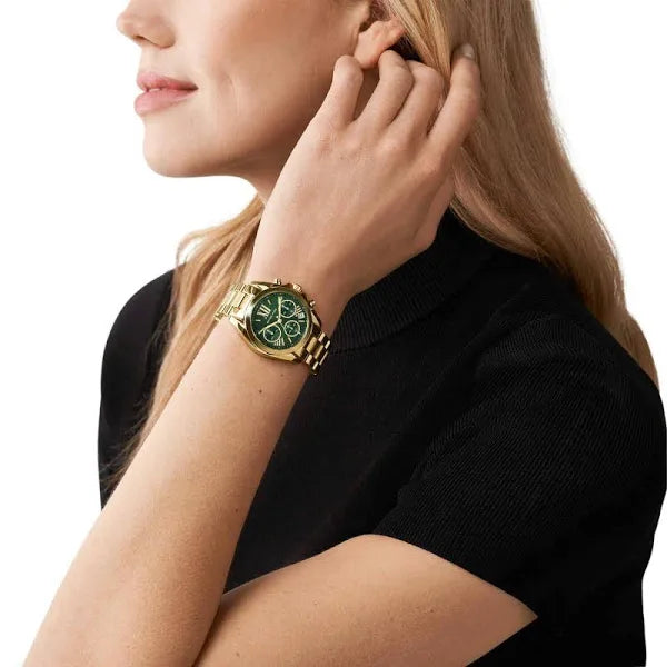Wearing View Of Michael Kors MK7257 Women's Stainless Steel Analog Green Dial Watch with Gold Band.