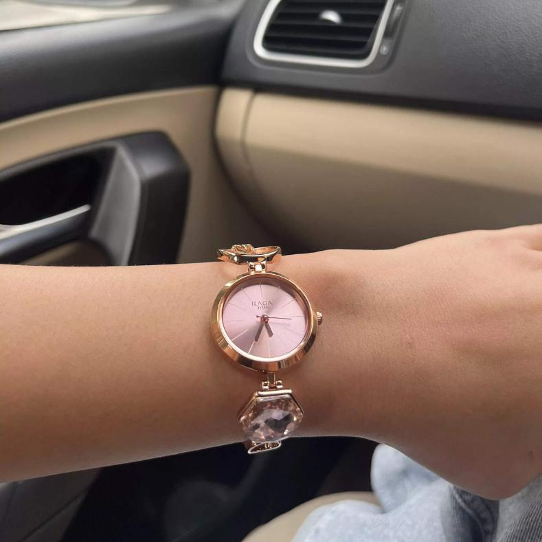 Wearing View Of Raga Women's Grace Watch: Mother of Pearl Dial & Ornate Bracelet NS2606WM09 - Elegant design with a distinctive ornamental strap.
