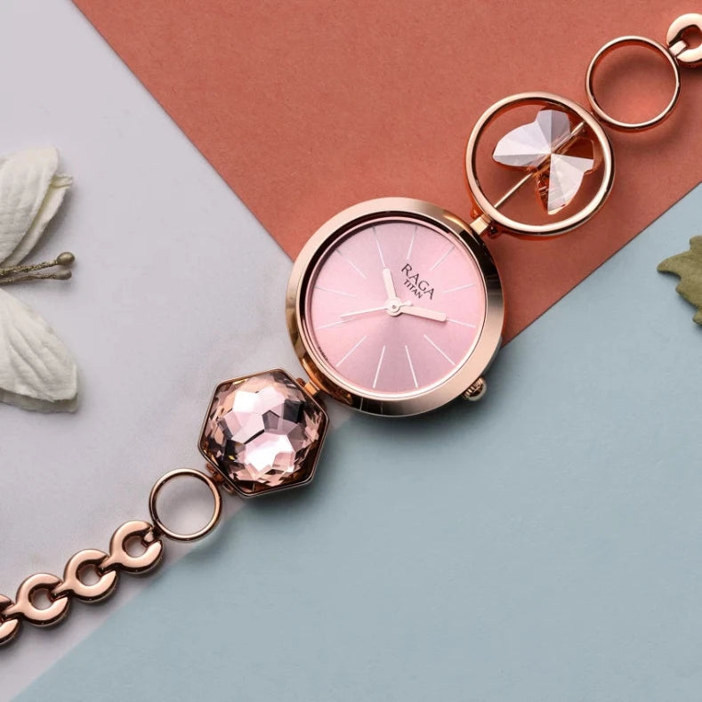 Raga Women's Grace Watch: Mother of Pearl Dial & Ornate Bracelet NS2606WM09 - Elegant design with a distinctive ornamental strap.