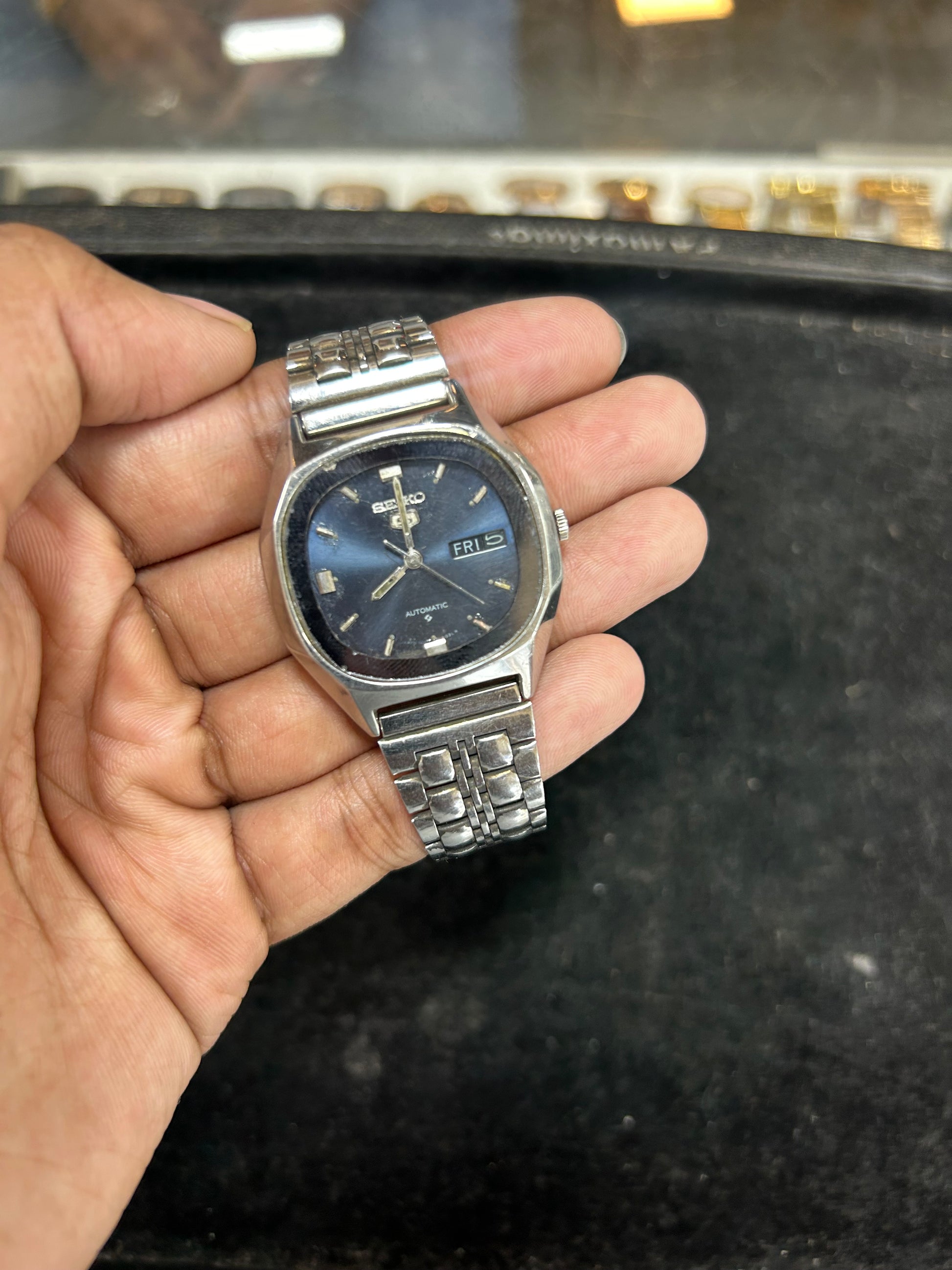 Close View Of Seiko Automatic Vintage Watch from the 1970s featuring 21-jewel movement, stainless steel case, day/date display, and mid-century design.