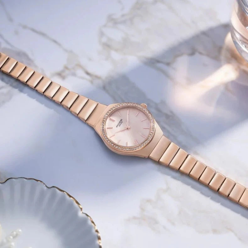 Sonata Poze Quartz Analog Pink Dial Metal Strap Watch for Women with a stylish special-shaped case and rose gold strap.