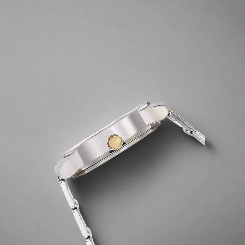 Side View Of TIMEX TW000J108 Analog Watch for Women with a sleek black dial, silver and gold stainless steel chain strap, and 30m water resistance for everyday elegance.