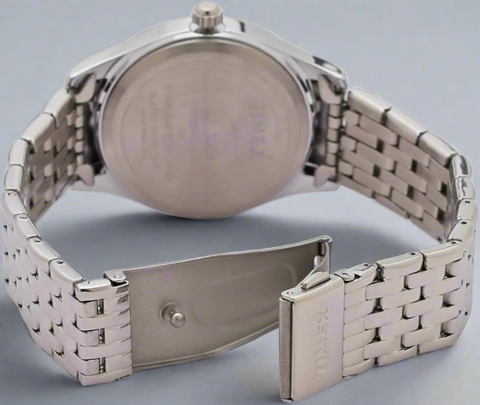 Back View Of TIMEX TW000W214 Analog Watch for Women with a minimalist white dial, durable stainless steel case, and silver strap for elegance and practicality.