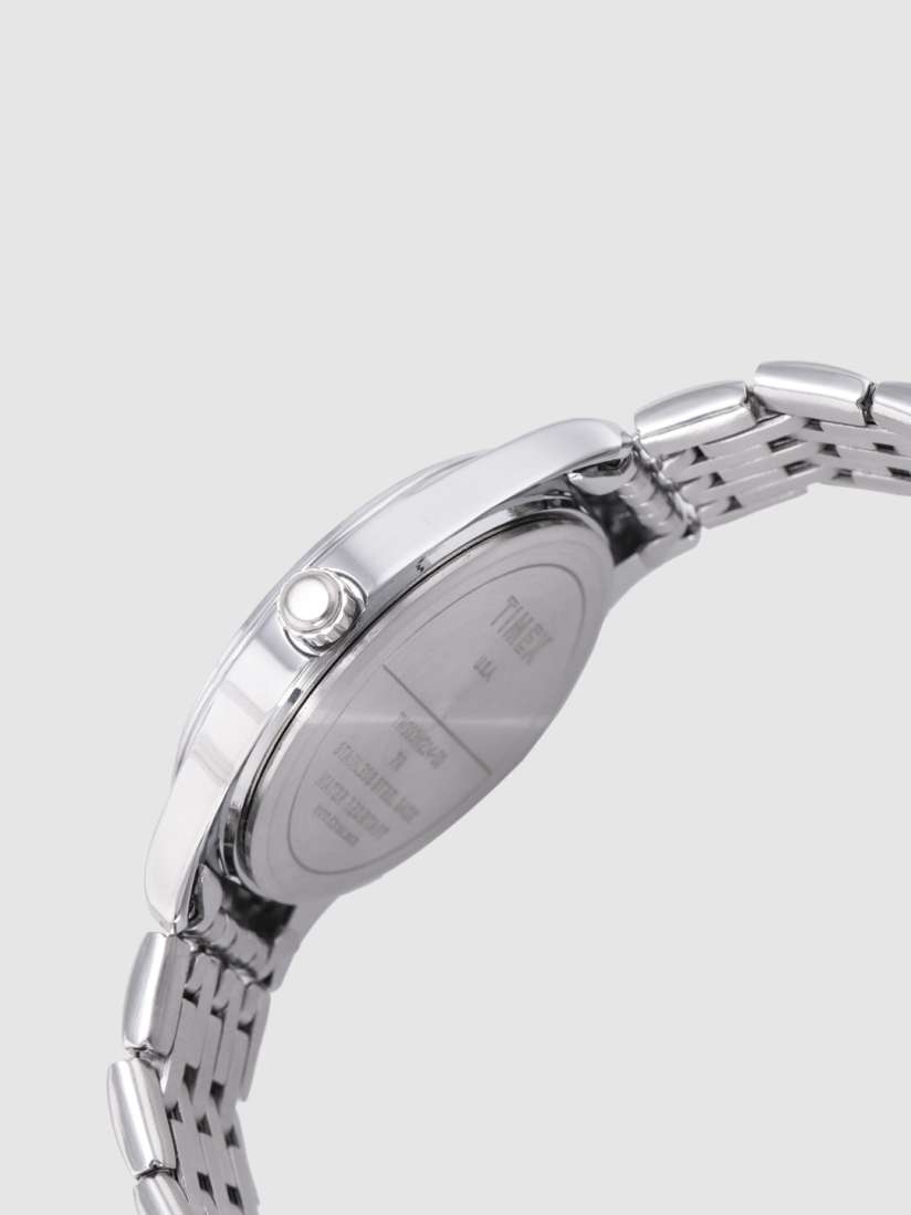 Side View Of TIMEX TW000W214 Analog Watch for Women with a minimalist white dial, durable stainless steel case, and silver strap for elegance and practicality.