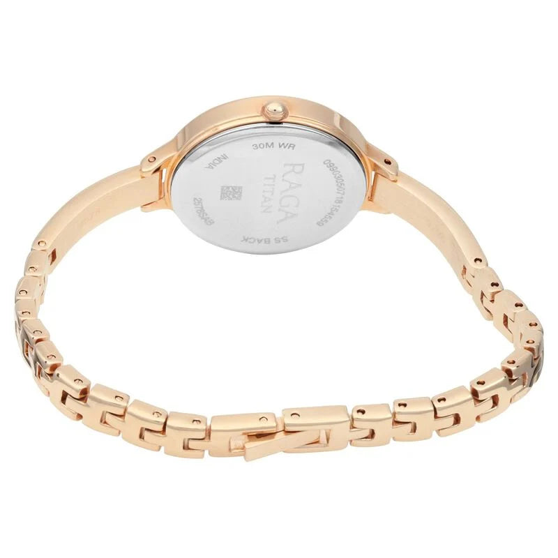 Back View Of Titan 2637WAA Quartz Analog Women's Watch with a silver-patterned dial, rose-gold crystal-embellished case, and a sleek metal bangle strap.
