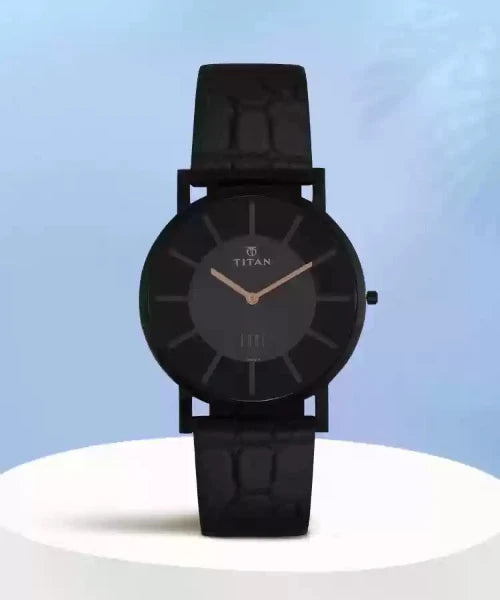 Titan NS1595NL01 Edge Slim Analog Watch for Men with Black Dial and Leather Strap. Ultra-slim design with stainless steel case and sapphire glass