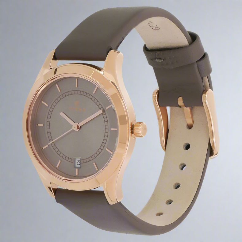 Side View Of Titan NS2596WL02 Workwear Women’s Watch with an anthracite dial and grey leather strap, featuring an analog display with date function