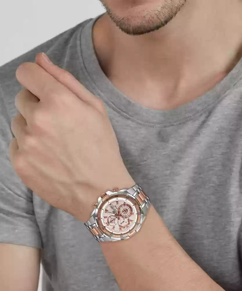 Wearing View Of Titan NS9308KM01 Regalia Rose Gold Chronograph Stainless Steel Strap Watch for Men with a sophisticated rose gold dial and two-toned stainless steel bracelet.