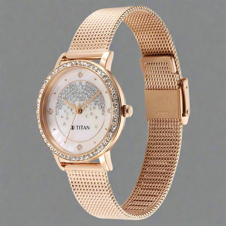 Titan Purple Style Up Quartz Analog Pink Dial Stainless Steel Strap Watch for Women NS95236WM03 - Chic pink dial with a rose gold stainless steel strap.