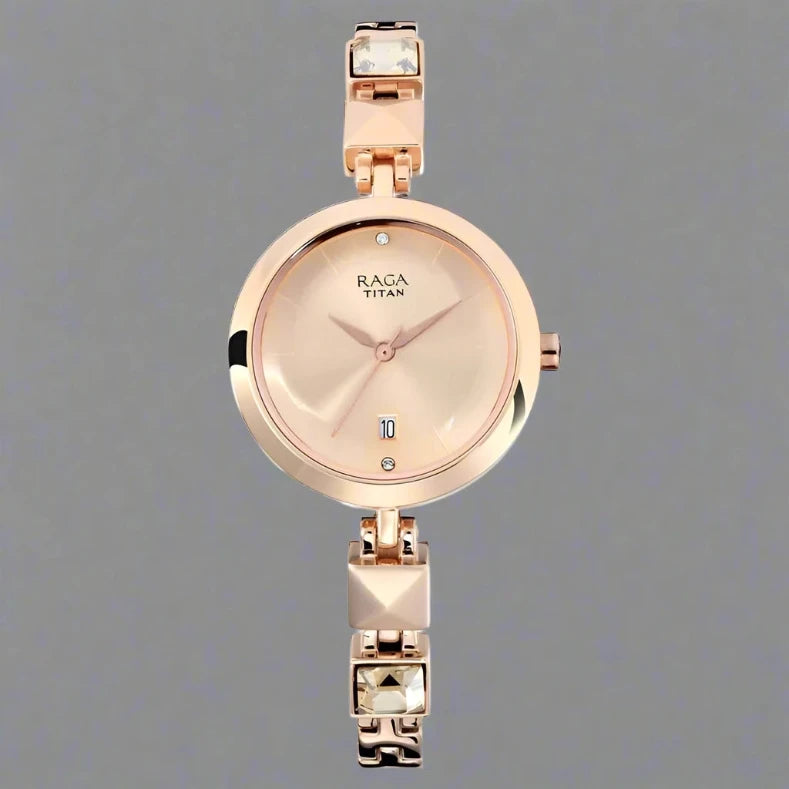Titan Raga Viva Rose Gold Dial Analog Metal Strap Watch for Women NS2606WM01 - Elegant design with baguette crystal detailing.