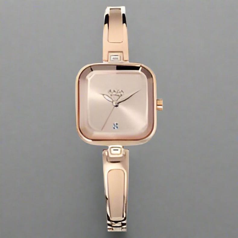 Titan Raga Viva Rose Gold Dial Women Watch With Metal Strap NS2607WM01 - Analog watch with date function and elegant jewelry clasp.