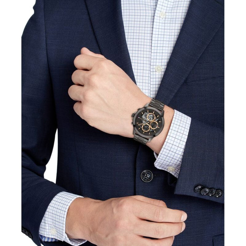 Wearing View Of Tommy Hilfiger 1710479 Men's Watch with Grey Dial, Grey-Tone Stainless Steel Case, and Bracelet