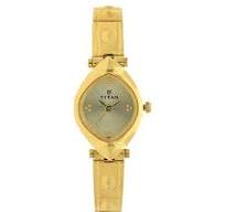 Titan Quartz Analog Champagne Dial Watch For Women With Golden Stainless Steel Strap