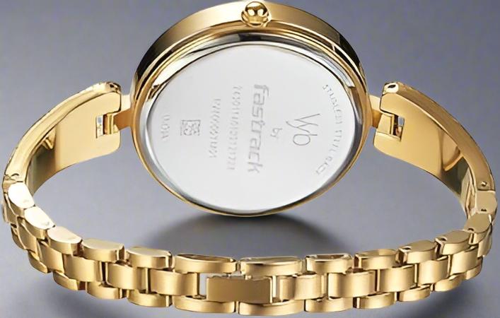 Back View Of Fastrack Vyb Diva Quartz Analog Golden Dial Metal Strap Watch.