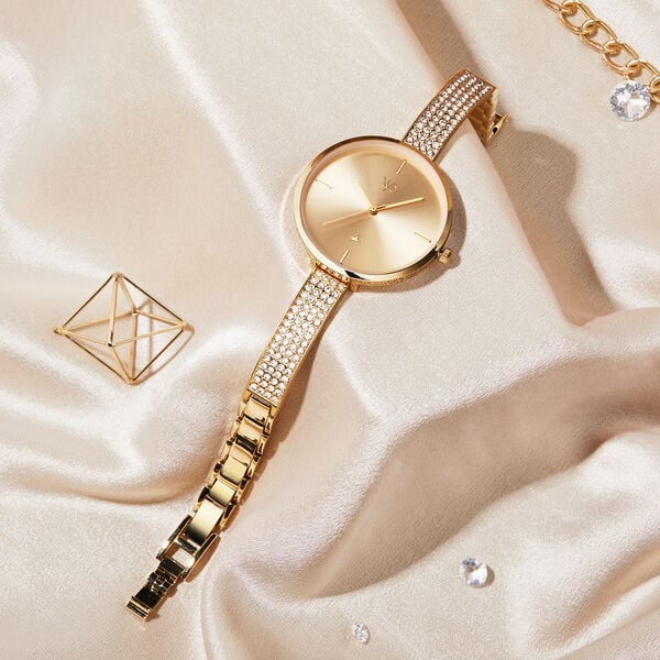 Fastrack Vyb Starlet FV60009YM01W women’s analog watch with gold-toned embellished dial and bracelet-style strap