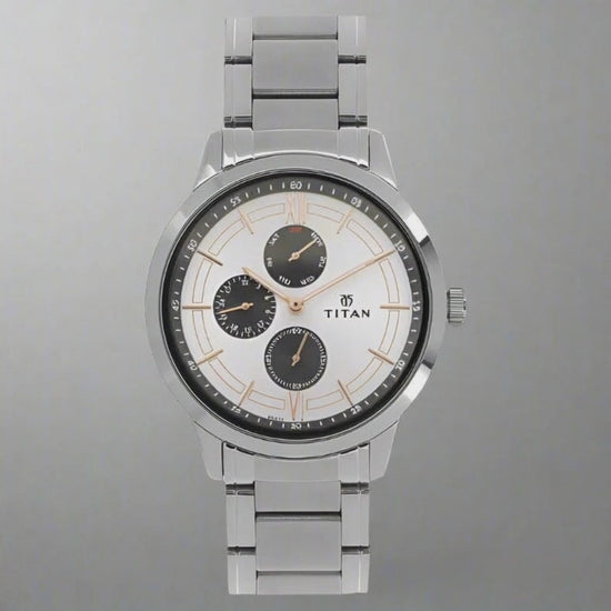 Video View Of Titan NT1769SM02 Workwear White Dial Quartz Multifunction Stainless Steel Strap Watch for Men with a sleek silver-tone case, rosegold indices, and a dual-tone metal strap.