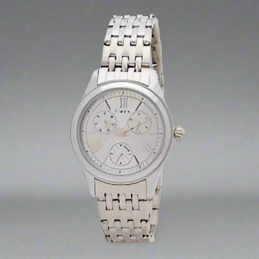 TIMEX TW000W214 Analog Watch for Women with a minimalist white dial, durable stainless steel case, and silver strap for elegance and practicality.